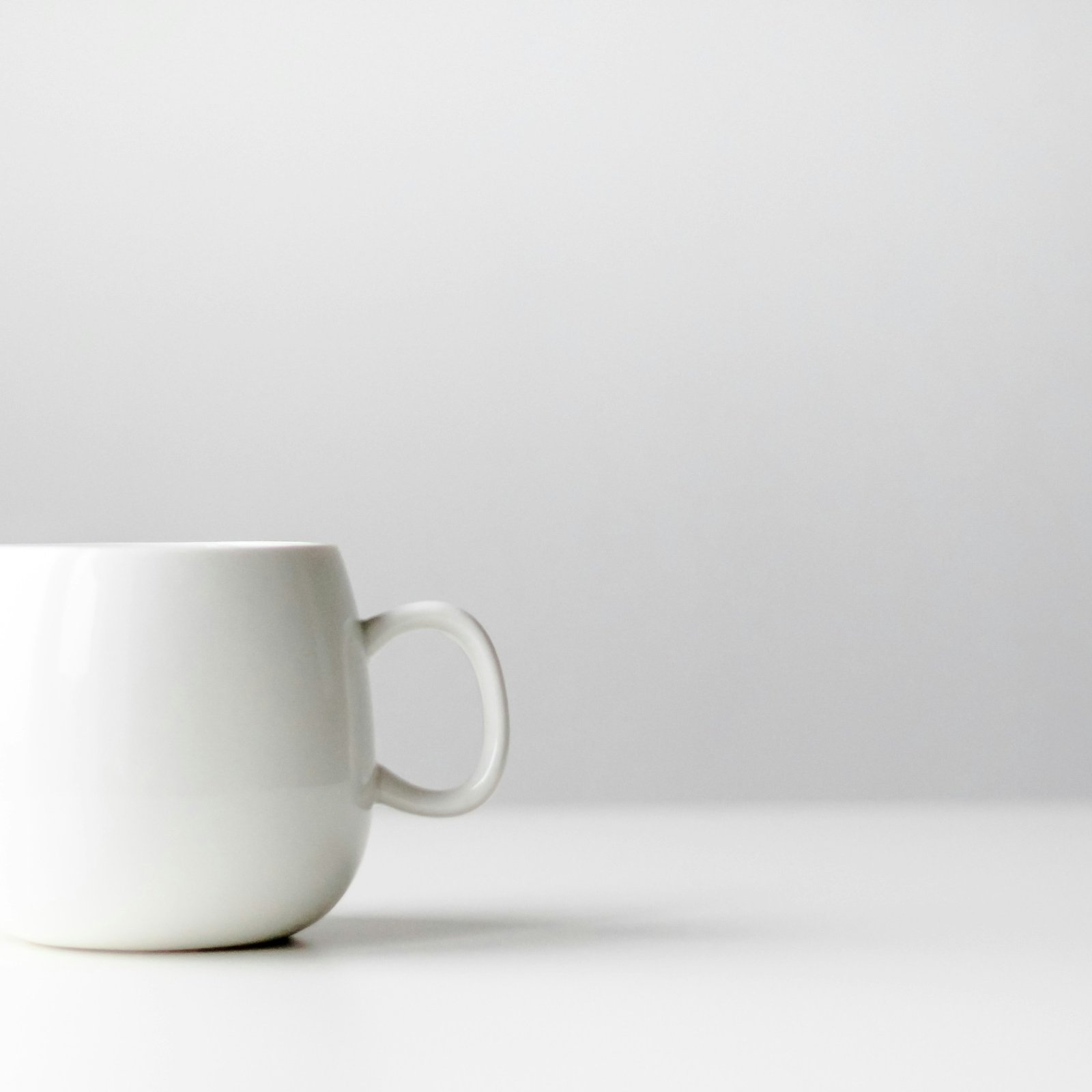 Matte ceramic mug on a paper ground